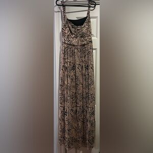 Long light pink dress with designs